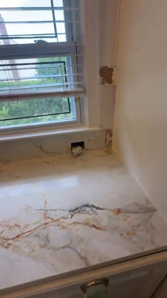 Gold-veined quartz at the window